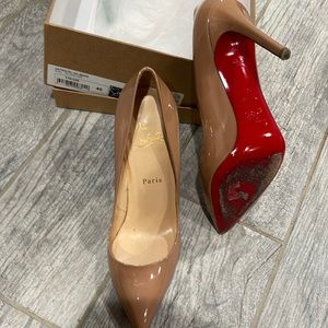 Tan Christian Louboutin in a size 40